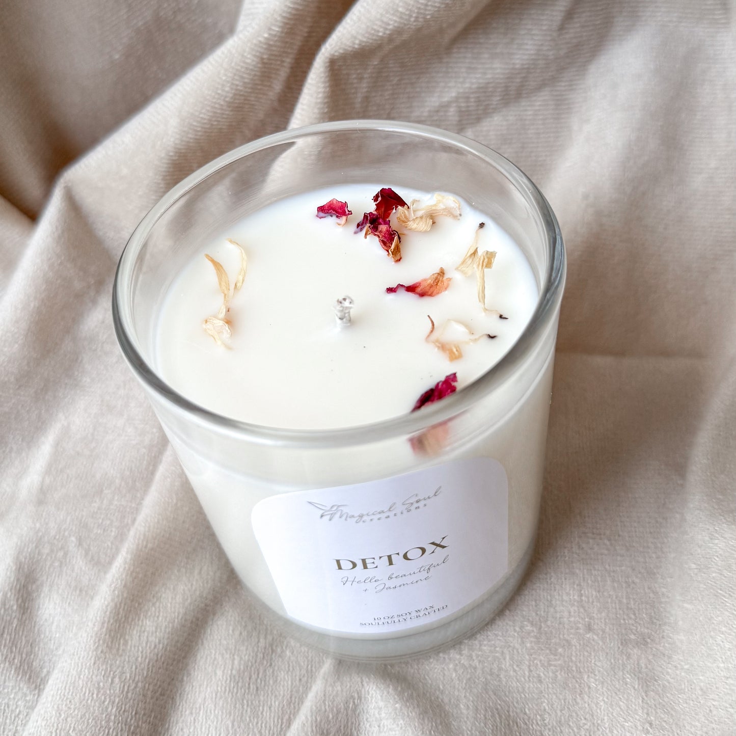 luxury soy candle for self care and stress relief with soft floral scent