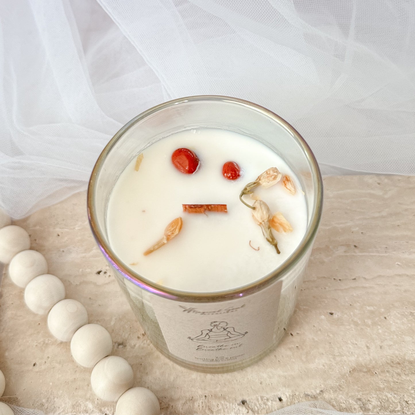 luxury yoga candle with red jasper and jasmine for calming rituals