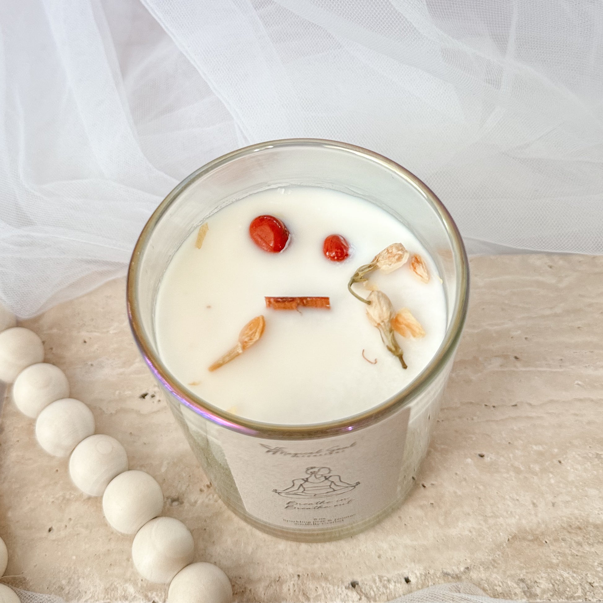 luxury yoga candle with red jasper and jasmine for calming rituals